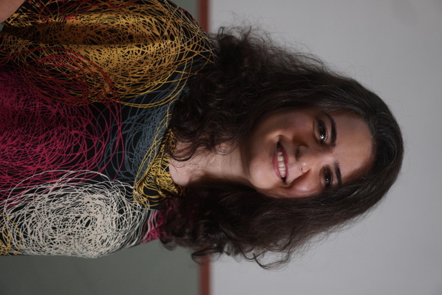 Headshot of Asreen Rostami.